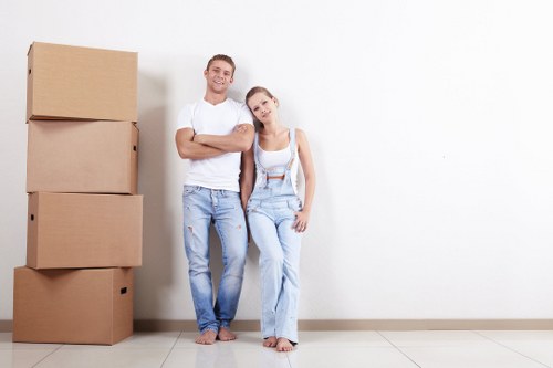 Removal team preparing household items for a move in Greenwich