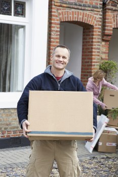 Moving company team reviewing modern slavery compliance documents