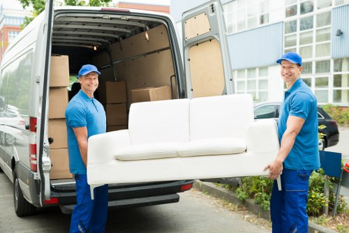 Same day removals team loading furniture in Greenwich