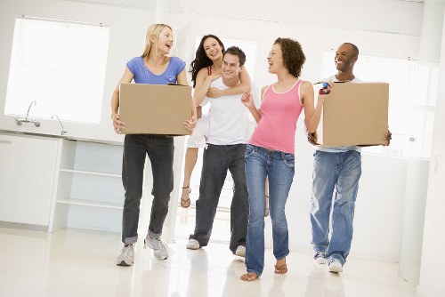 Packing boxes and moving supplies arranged for a Greenwich home relocation