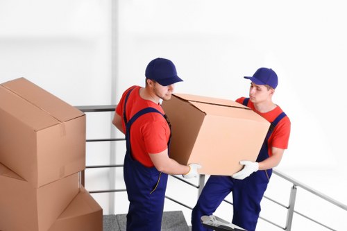 Customer completing a Greenwich Movers payment using a secure card or digital checkout