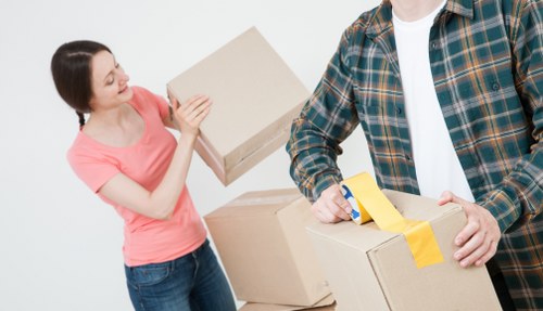 Local Greenwich movers navigating a residential street