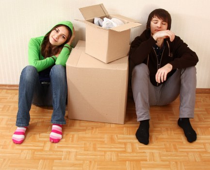 Greenwich removals team handling boxes during a residential move