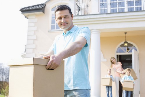 Local Greenwich moving service handling boxes and furniture
