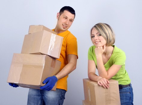 Greenwich relocation crew managing furniture on moving day
