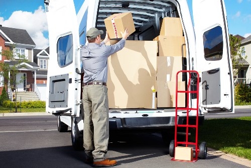 Careful handling of fragile items during packing and unpacking in Greenwich
