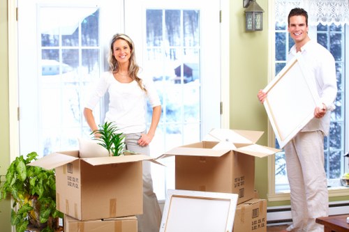 Local Greenwich moving service handling boxes and furniture