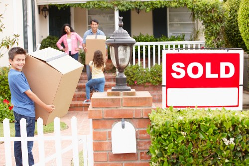Movers managing furniture and belongings for a relocation service