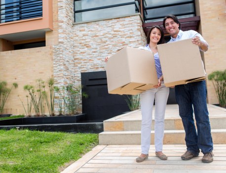 Trained movers working together on a safe relocation